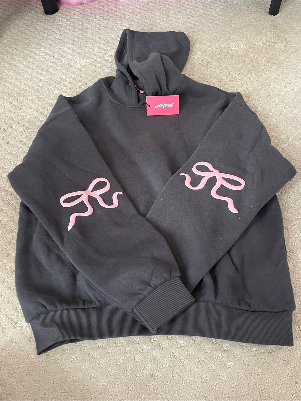 Edikted Black Crewneck Hoodie with Pink Bow Sleeve Accents